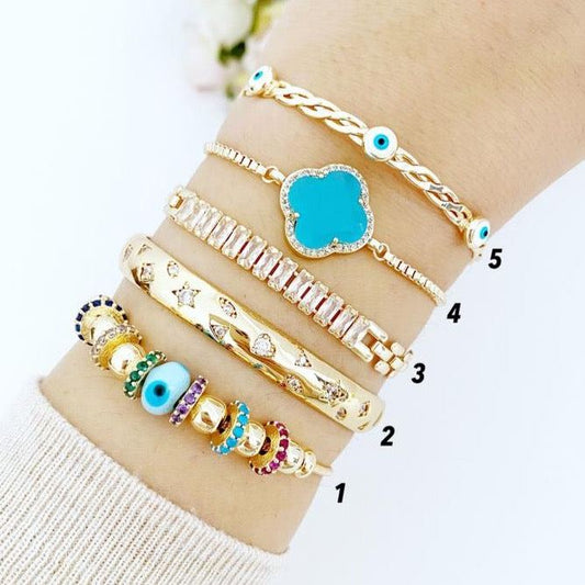 Evil Eye Bracelet with Blue Glass Pandora Charm in Gold, featuring 316L Stainless Steel for tarnish resistance.